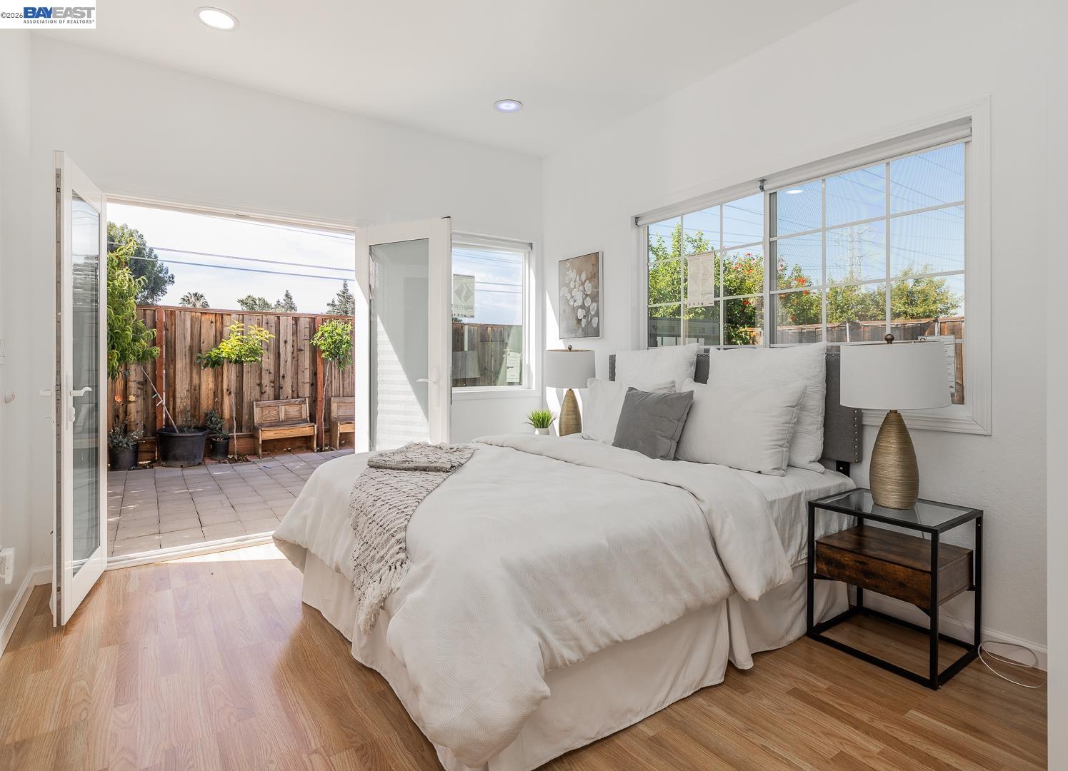 4032 Doane Street Fremont, CA 94538 - Photo 13 of 39 a spacious bedroom with a bed and large windows