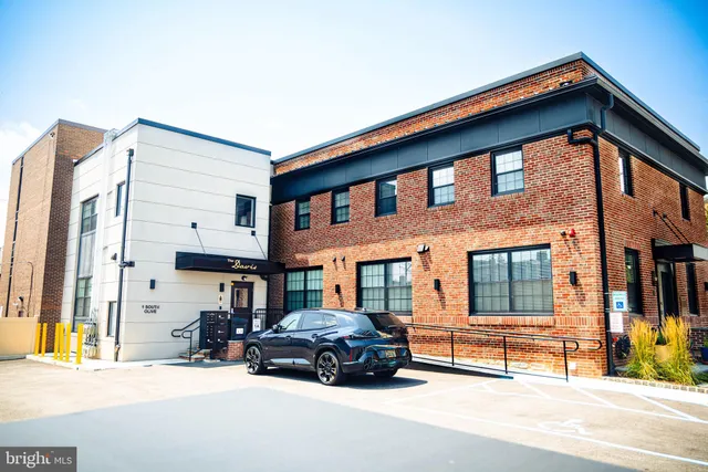 a car parked in front of a building