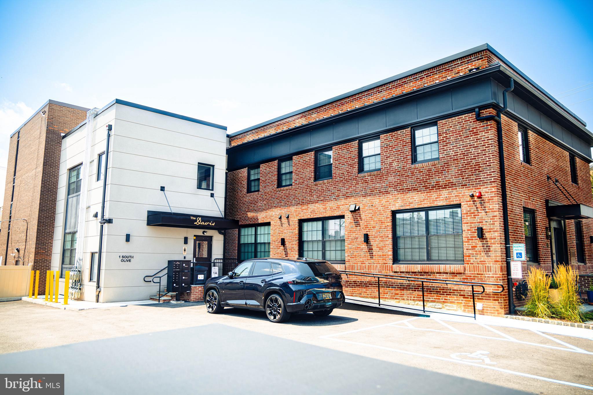 1 South Olive Street, Unit L1 Media, PA 19063 - Photo 3 of 17 a car parked in front of a building