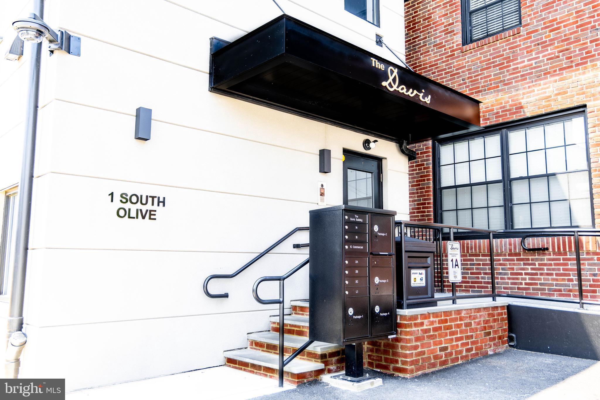 1 South Olive Street, Unit L1 Media, PA 19063 - Photo 4 of 17 a black and white photo of a room