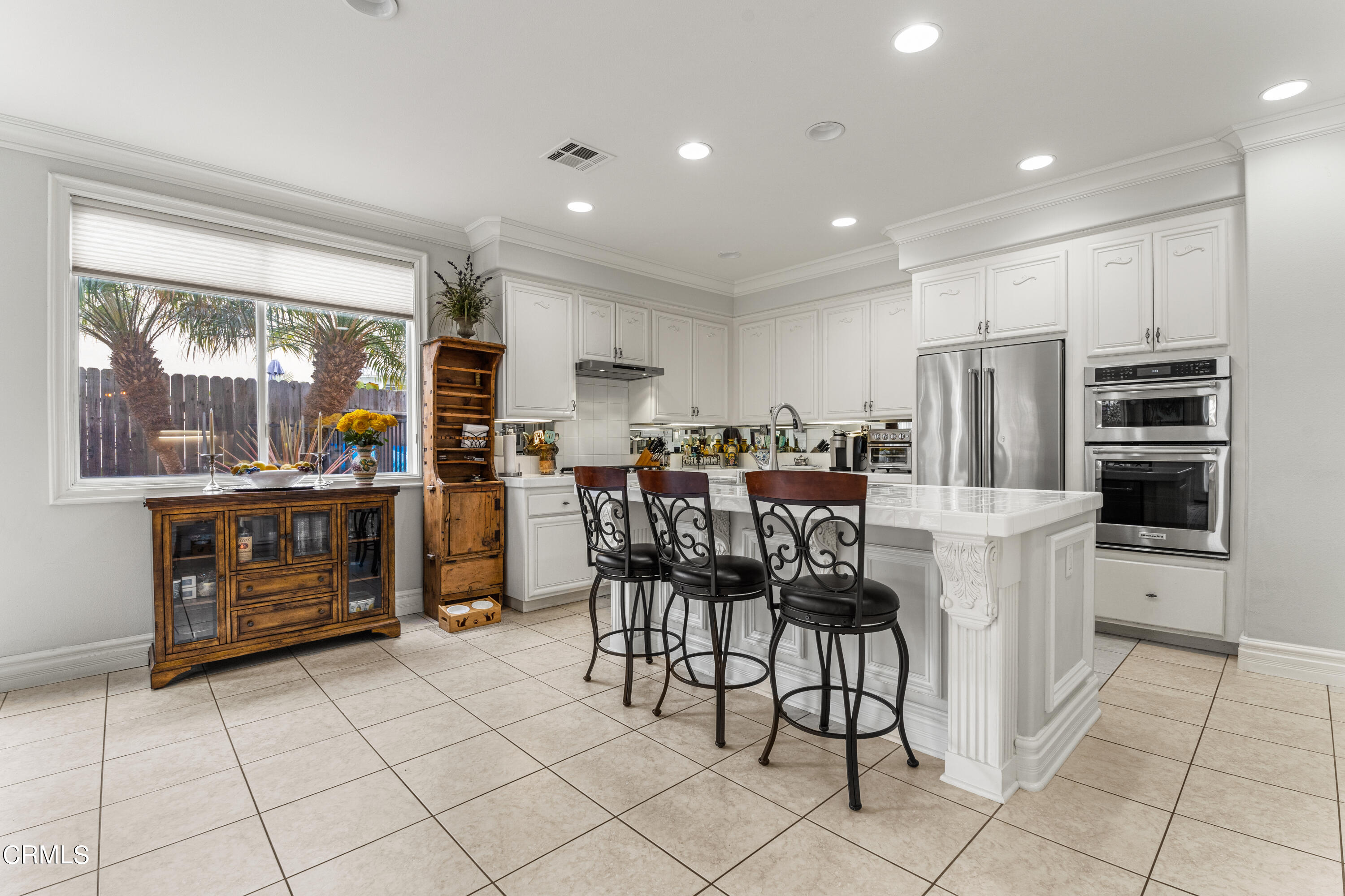 1555 Corte Olivas Camarillo, CA 93012 - Photo 12 of 45 a kitchen with stainless steel appliances a refrigerator and a stove top oven