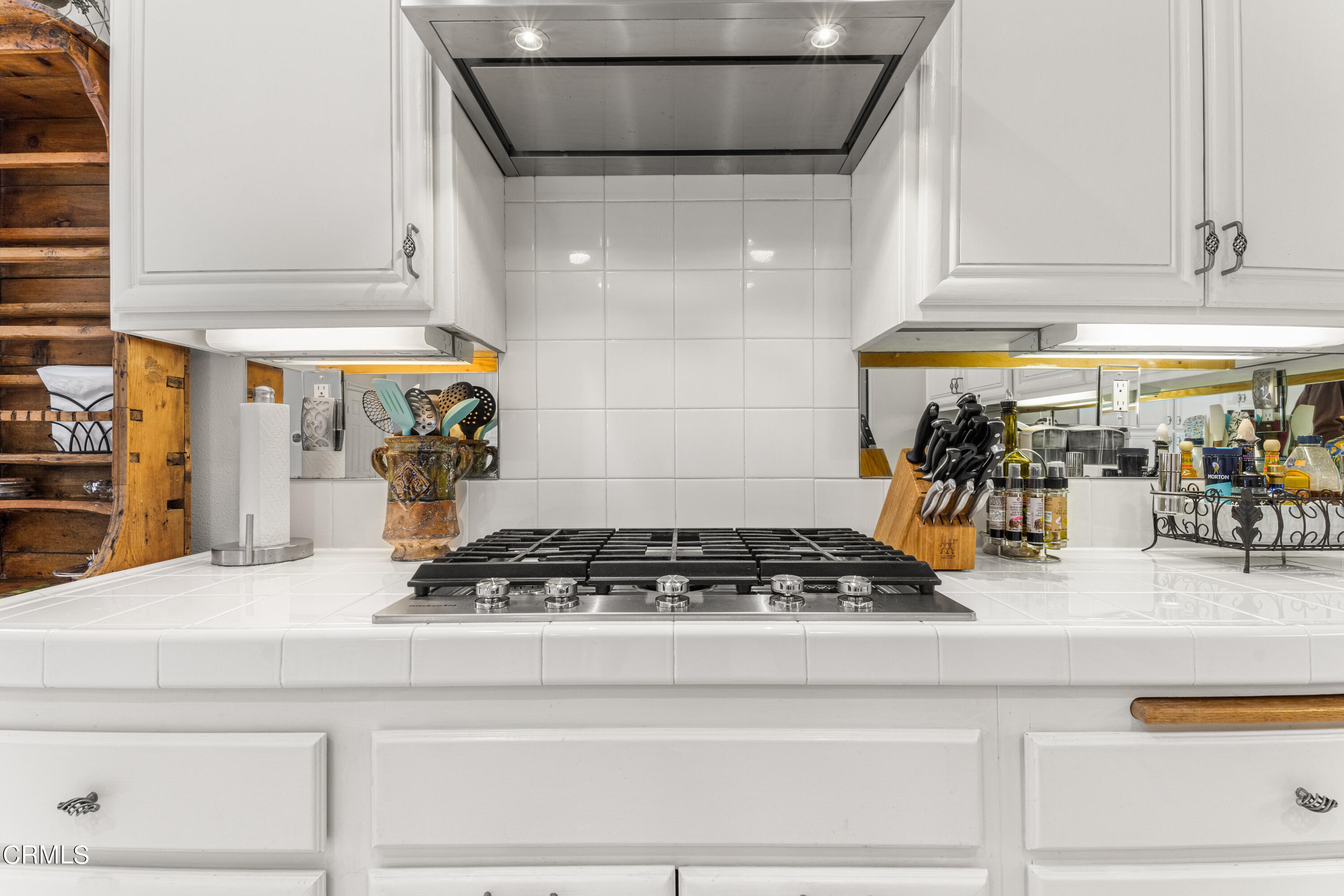 1555 Corte Olivas Camarillo, CA 93012 - Photo 13 of 45 a kitchen with a stove and a refrigerator