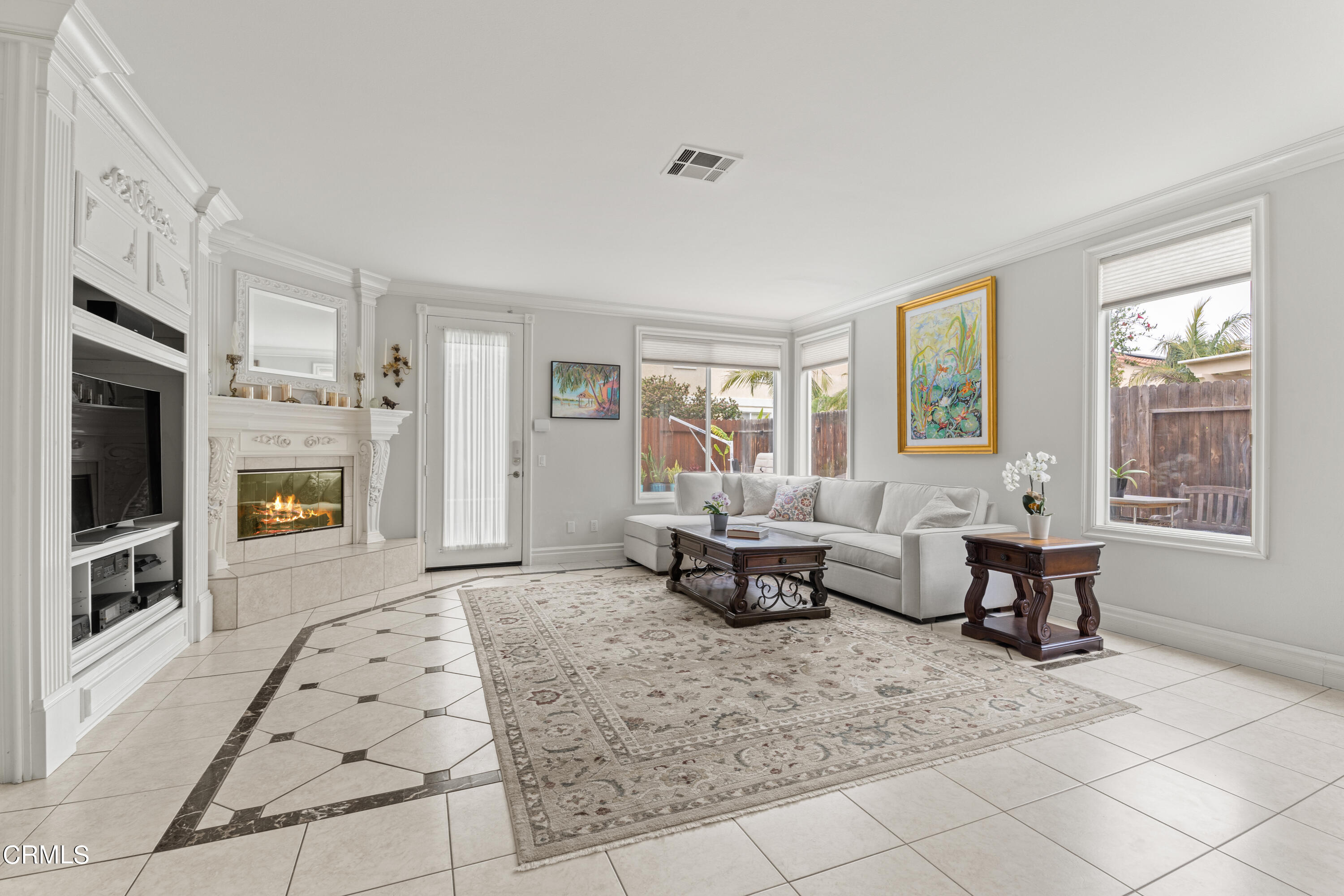 1555 Corte Olivas Camarillo, CA 93012 - Photo 17 of 45 a living room with furniture fireplace and flat screen tv