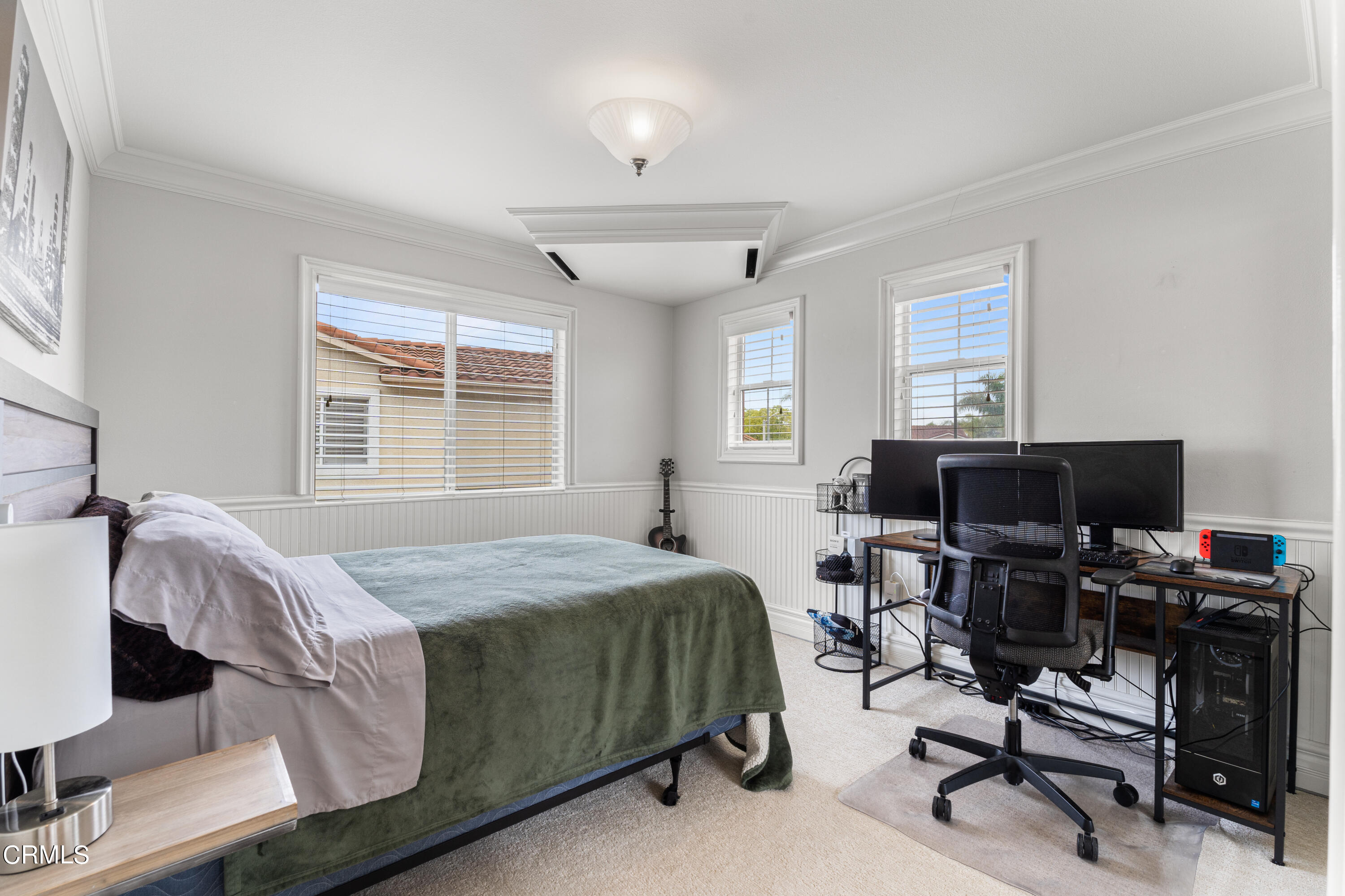 1555 Corte Olivas Camarillo, CA 93012 - Photo 27 of 45 a bedroom with a bed and a desk