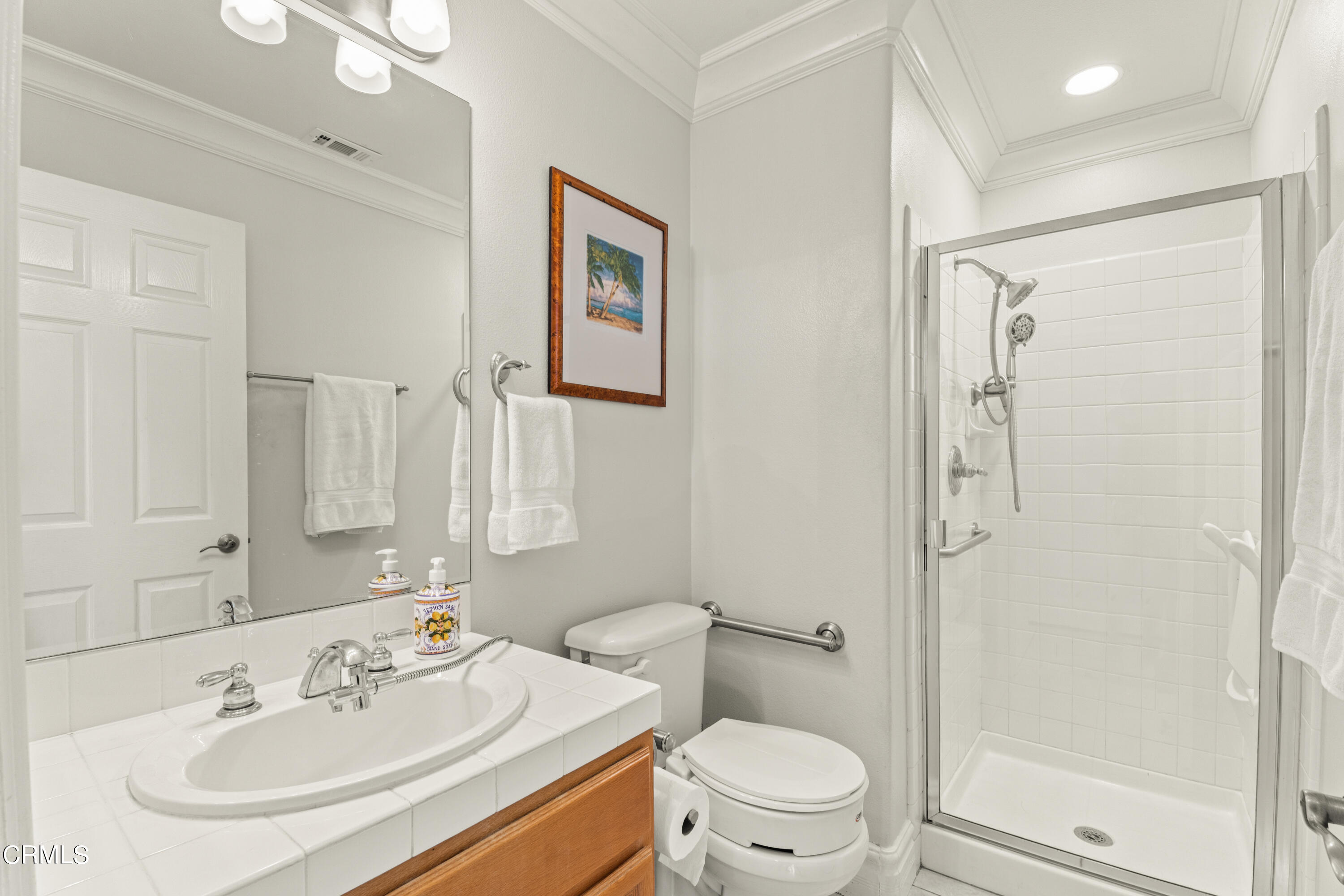 1555 Corte Olivas Camarillo, CA 93012 - Photo 30 of 45 a bathroom with a sink toilet and shower