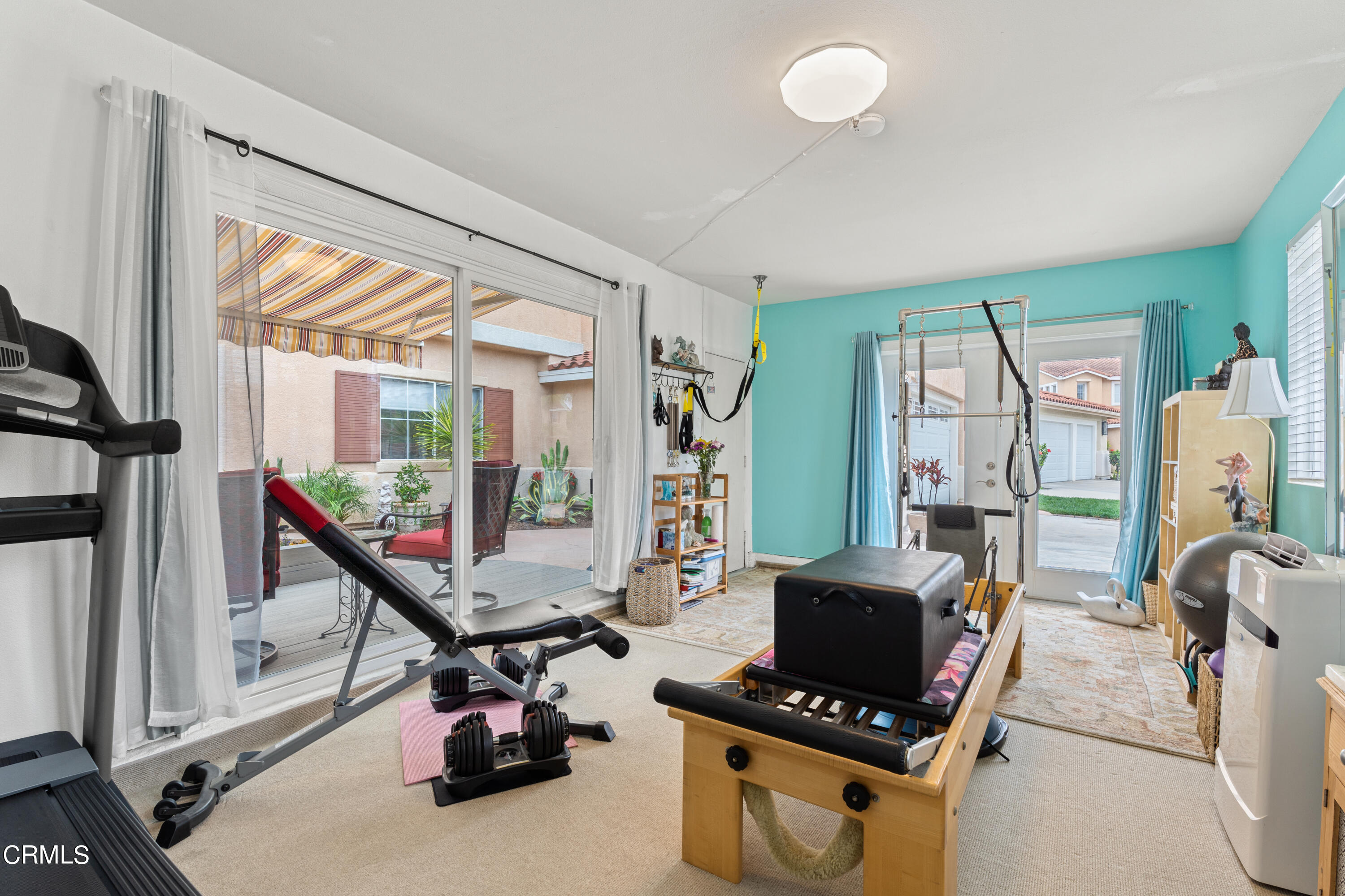 1555 Corte Olivas Camarillo, CA 93012 - Photo 35 of 45 a room with furniture and large windows