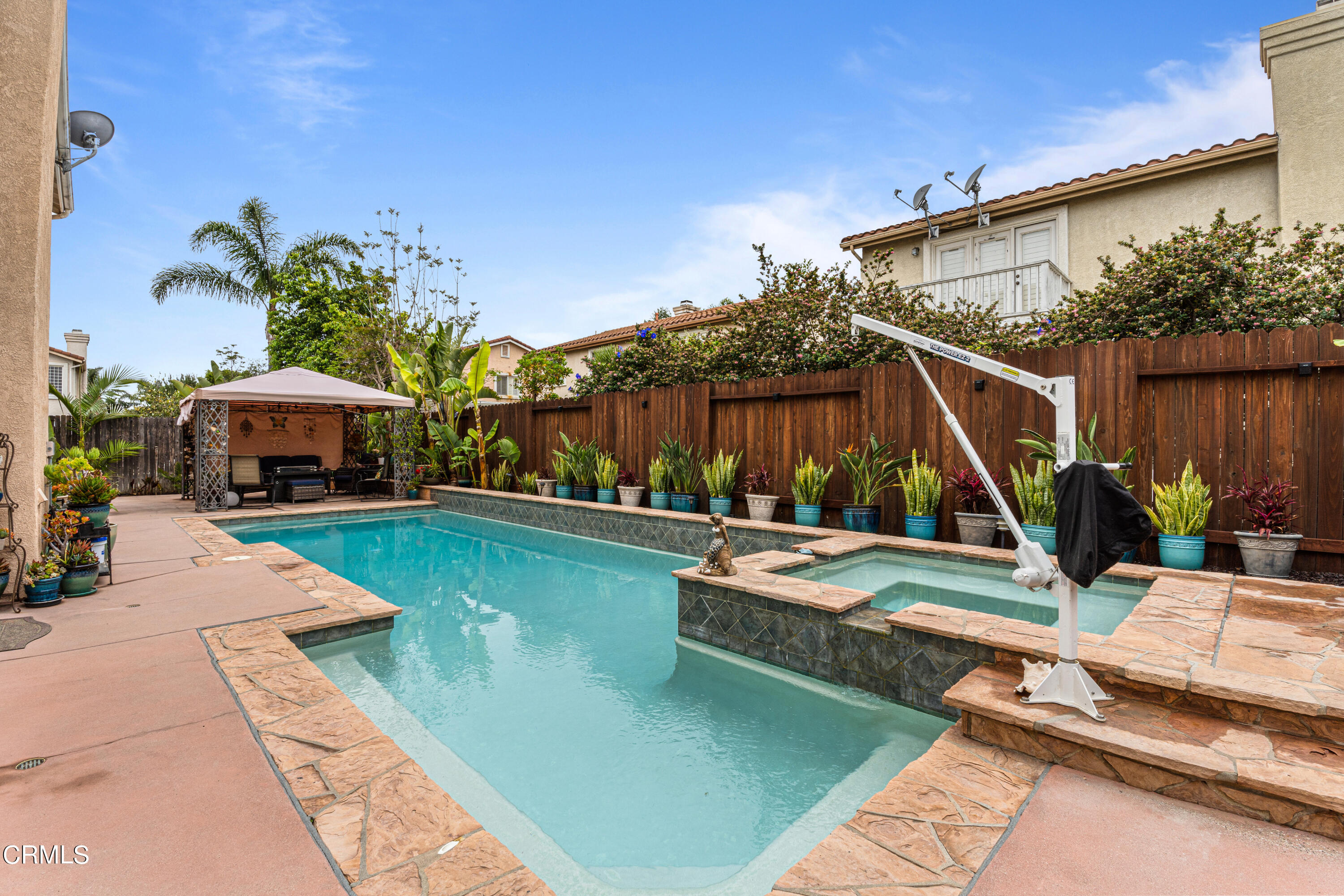 1555 Corte Olivas Camarillo, CA 93012 - Photo 38 of 45 a view of a house with backyard water fountain and sitting area