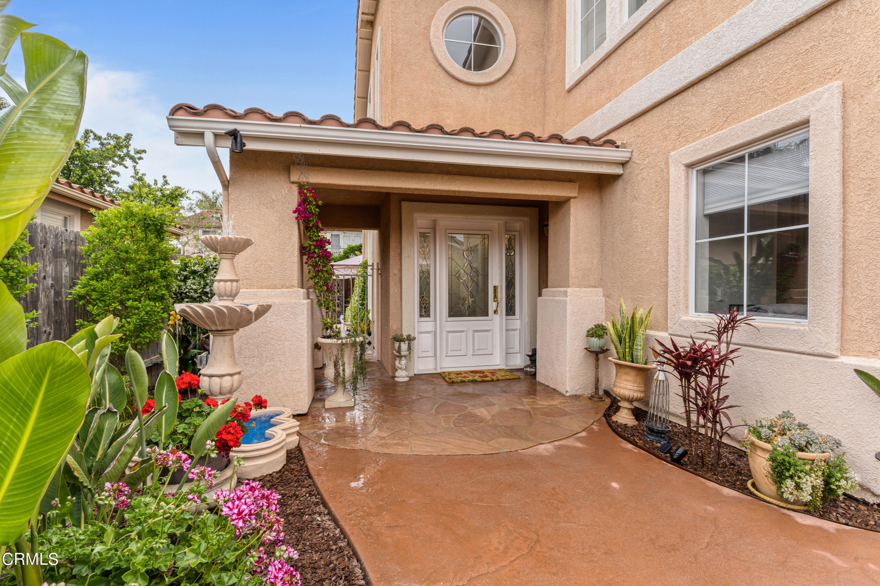 1555 Corte Olivas Camarillo, CA 93012 - Photo 4 of 45 a front view of a house