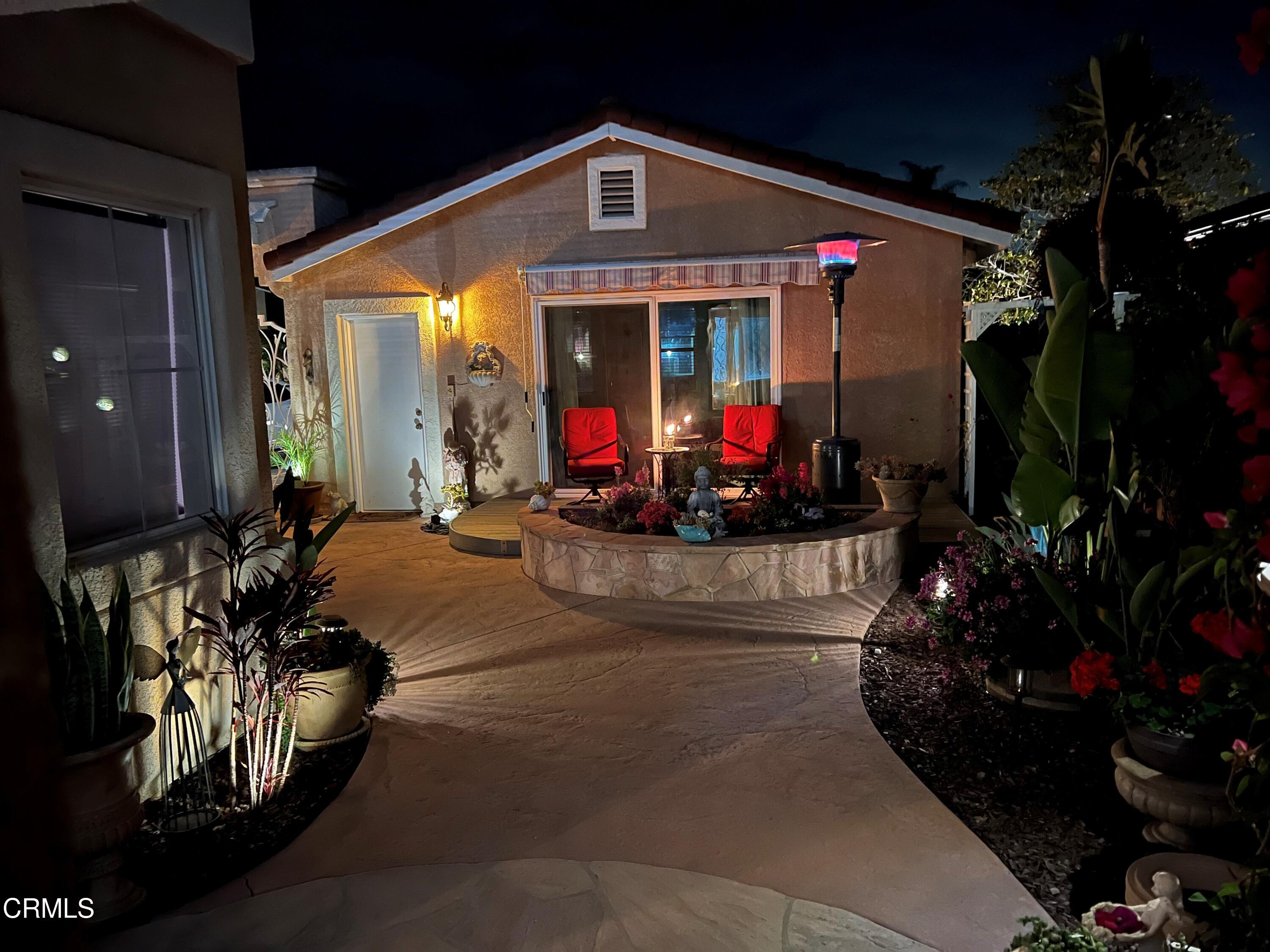 1555 Corte Olivas Camarillo, CA 93012 - Photo 6 of 45 a front view of a house with outdoor seating