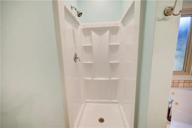 a room with furniture and a flat screen tv