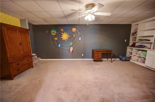 a view of a livingroom from a hallway