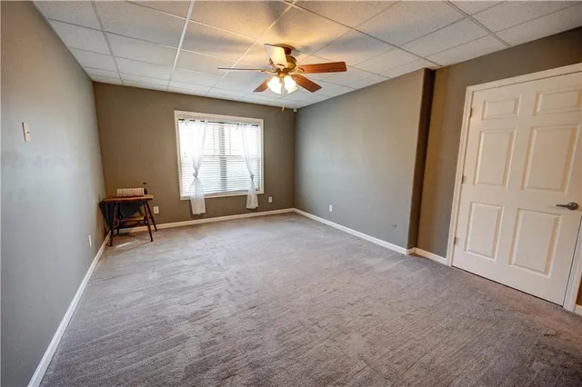 a view of a swimming pool with an outdoor seating