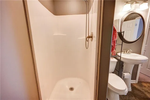 front view of a house with potted plants