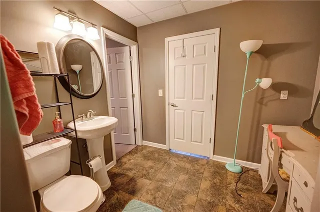 a aerial view of a house with a yard