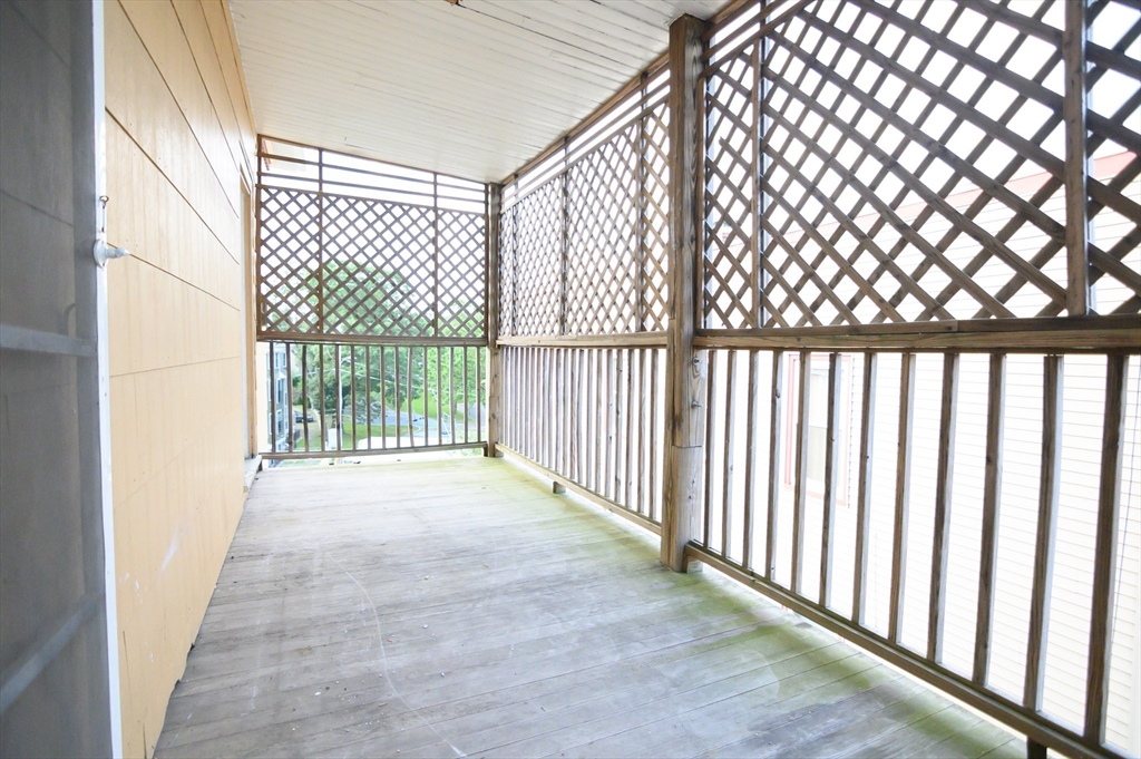 4 Burton Avenue, Unit 3 Boston, MA 02119 - Photo 7 of 17 a view of a black gate