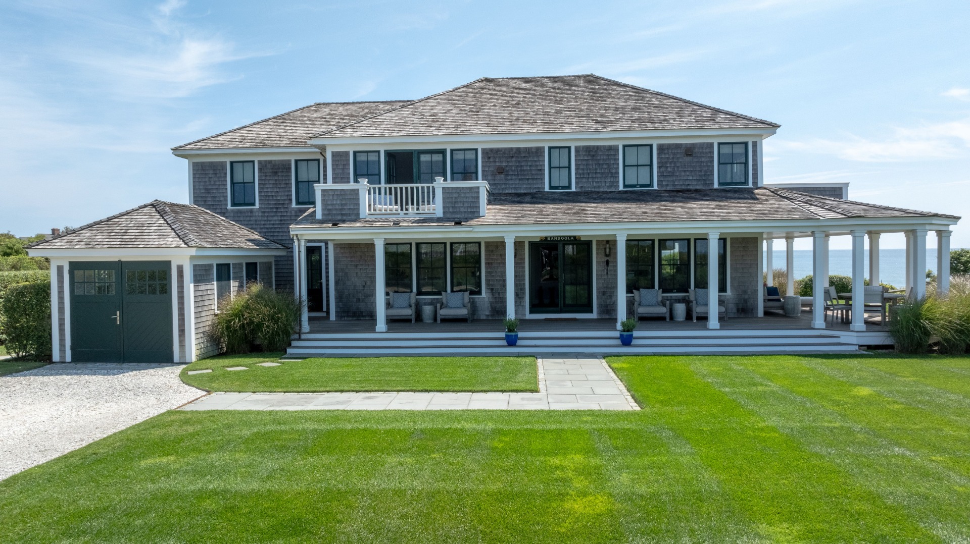 34 Bosworth Road Nantucket, MA 02554 - Photo 2 of 38 front view of a house with a yard