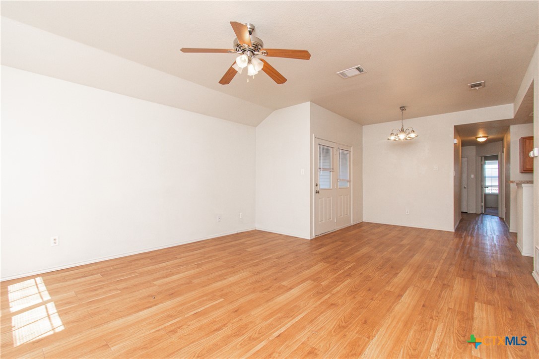 6509 Temora Loop, Unit A Killeen, TX 76549 - Photo 2 of 19 a view of empty room with wooden floor and fan