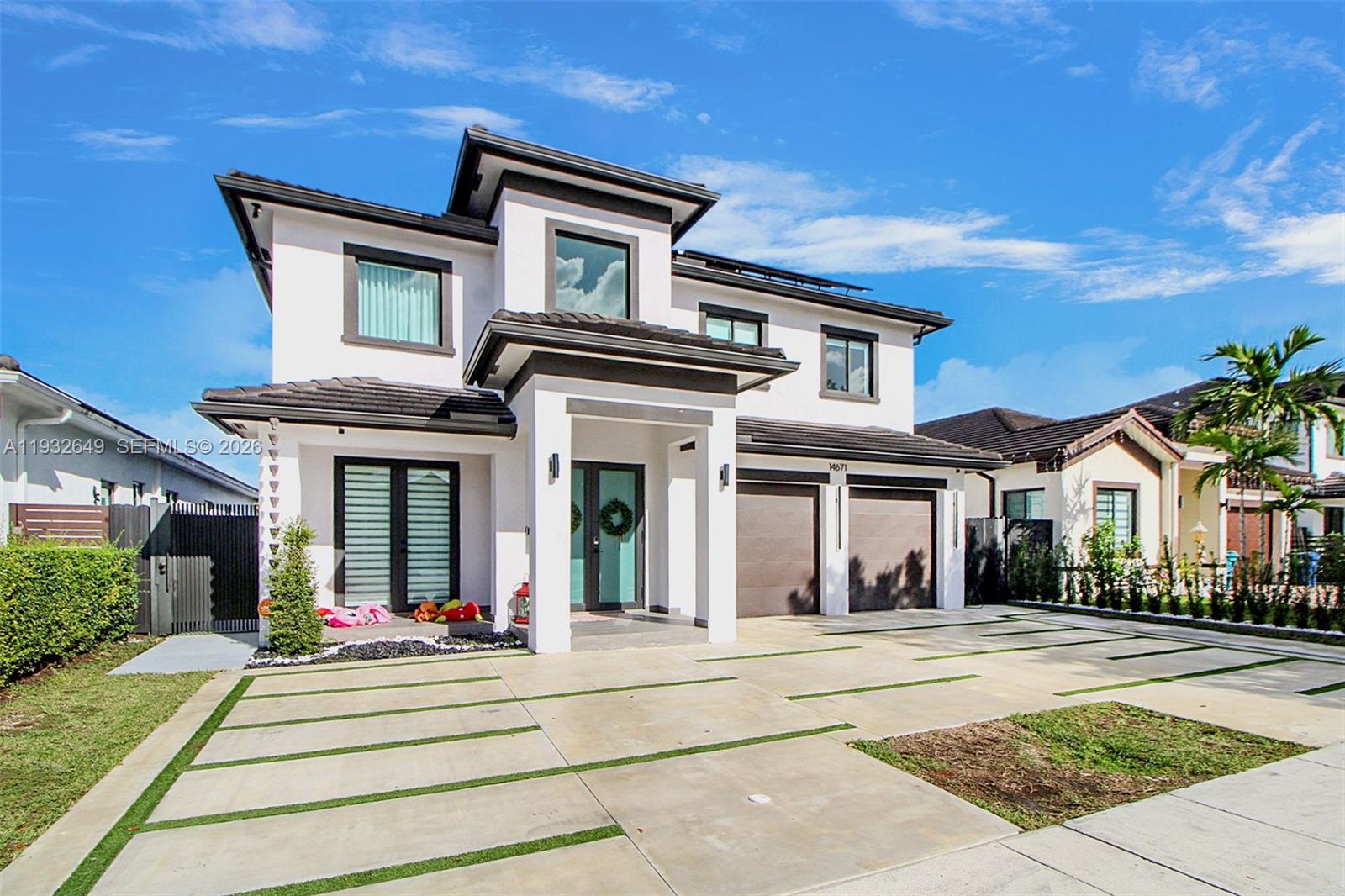 front view of a house with a small yard