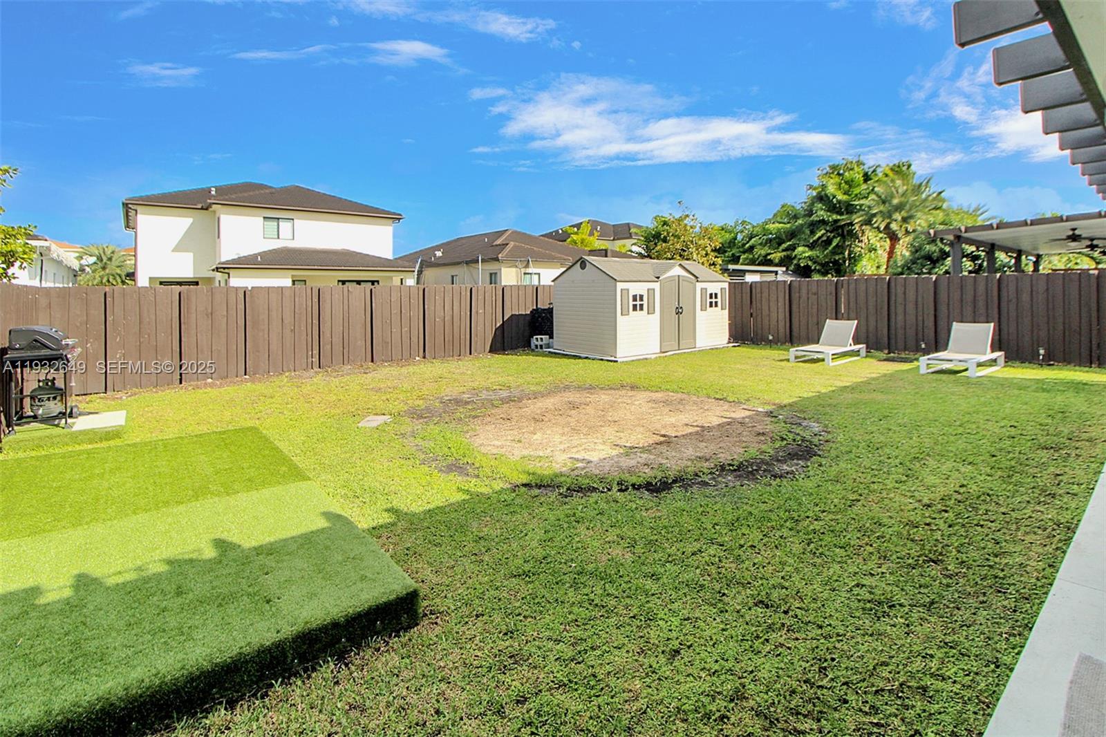 14671 Southwest 20th Street Miami, FL 33175 - Photo 13 of 53 a swimming pool with yard and outdoor seating