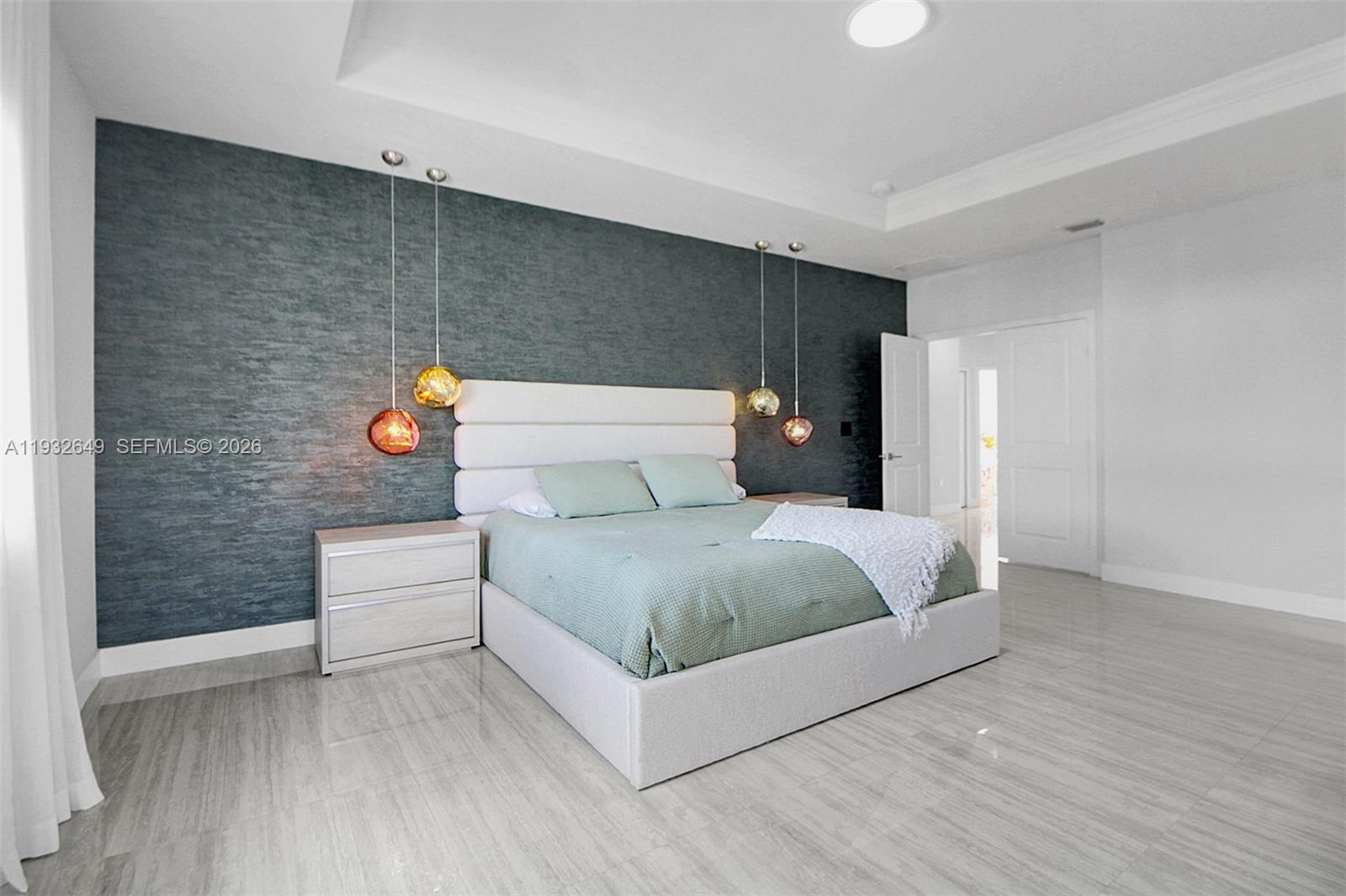 14671 Southwest 20th Street Miami, FL 33175 - Photo 19 of 50 a bedroom with a bed and a table