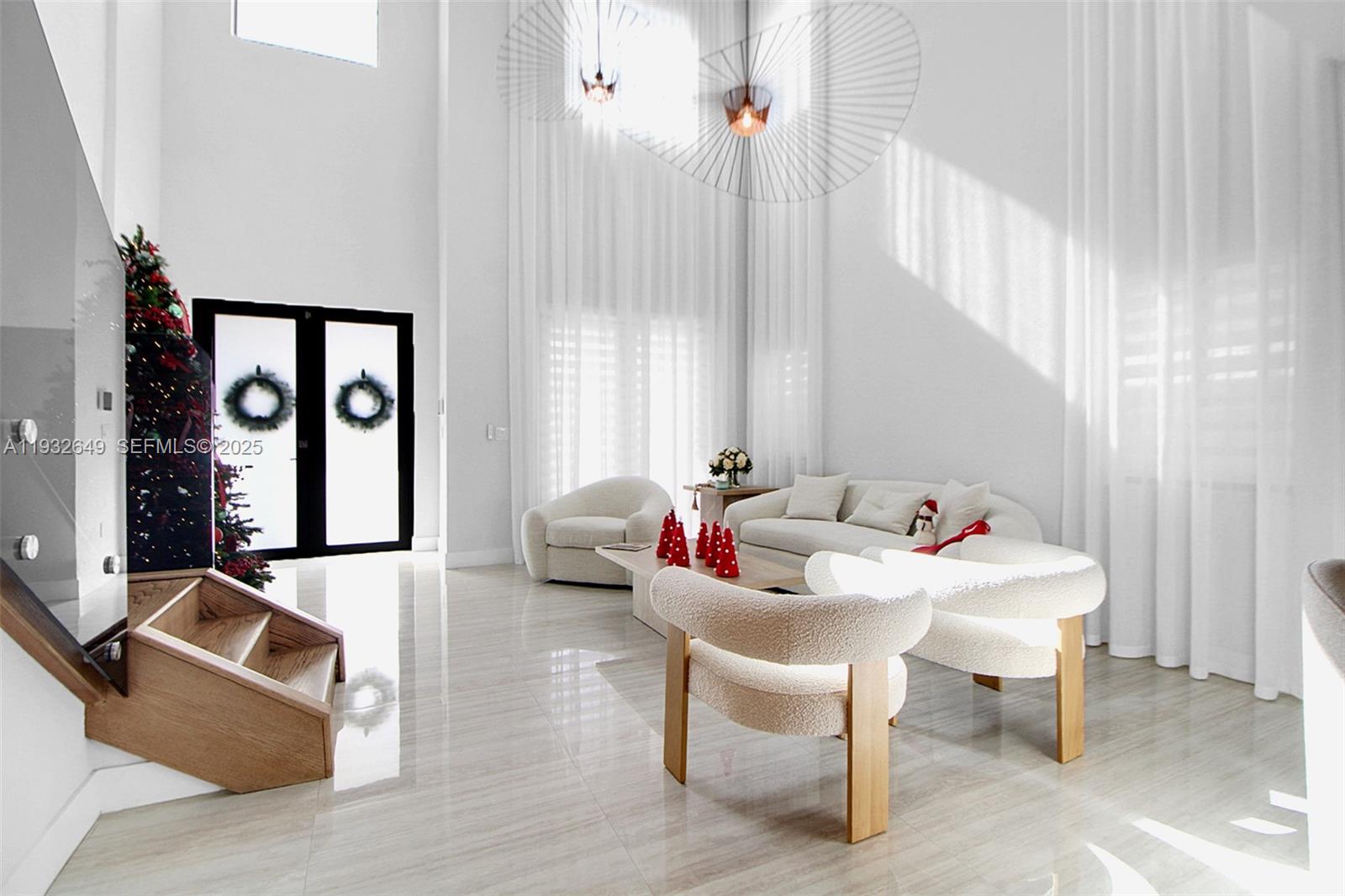 14671 Southwest 20th Street Miami, FL 33175 - Photo 21 of 53 a living room with furniture and a large window