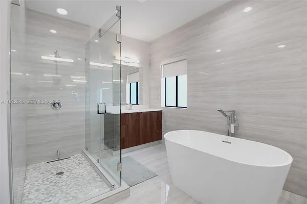 a view of a livingroom and a hallway