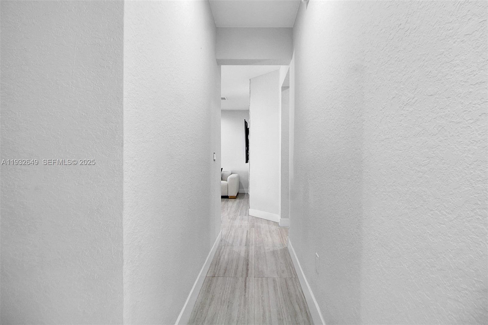 14671 Southwest 20th Street Miami, FL 33175 - Photo 24 of 53 a view of a room with wooden floor