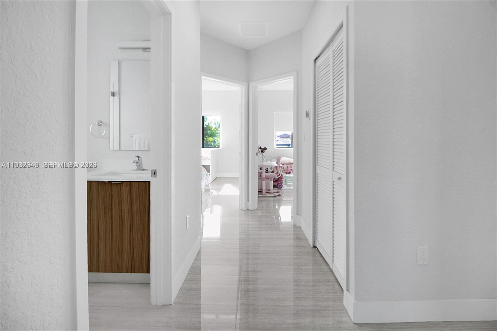 14671 Southwest 20th Street Miami, FL 33175 - Photo 30 of 50 a view of a livingroom and a hallway