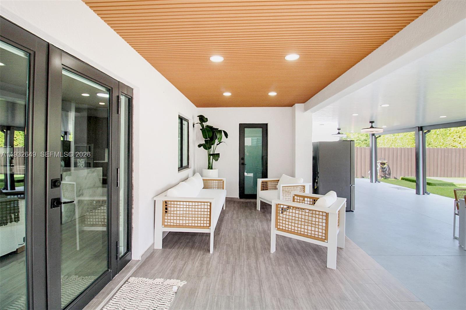 14671 Southwest 20th Street Miami, FL 33175 - Photo 36 of 50 a lobby with furniture and wooden floor