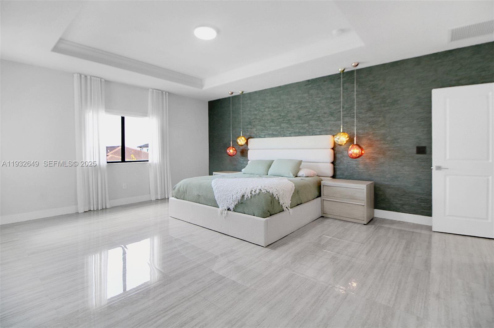 14671 Southwest 20th Street Miami, FL 33175 - Photo 37 of 53 a bedroom with a bed and a couch