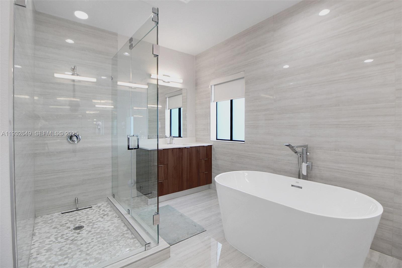 14671 Southwest 20th Street Miami, FL 33175 - Photo 41 of 53 a bathroom with a bathtub and shower