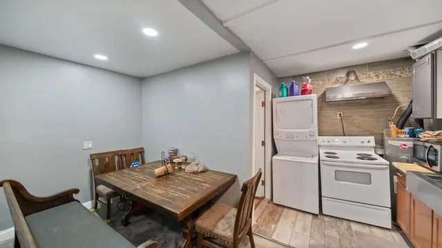 a kitchen with a stove and a microwave