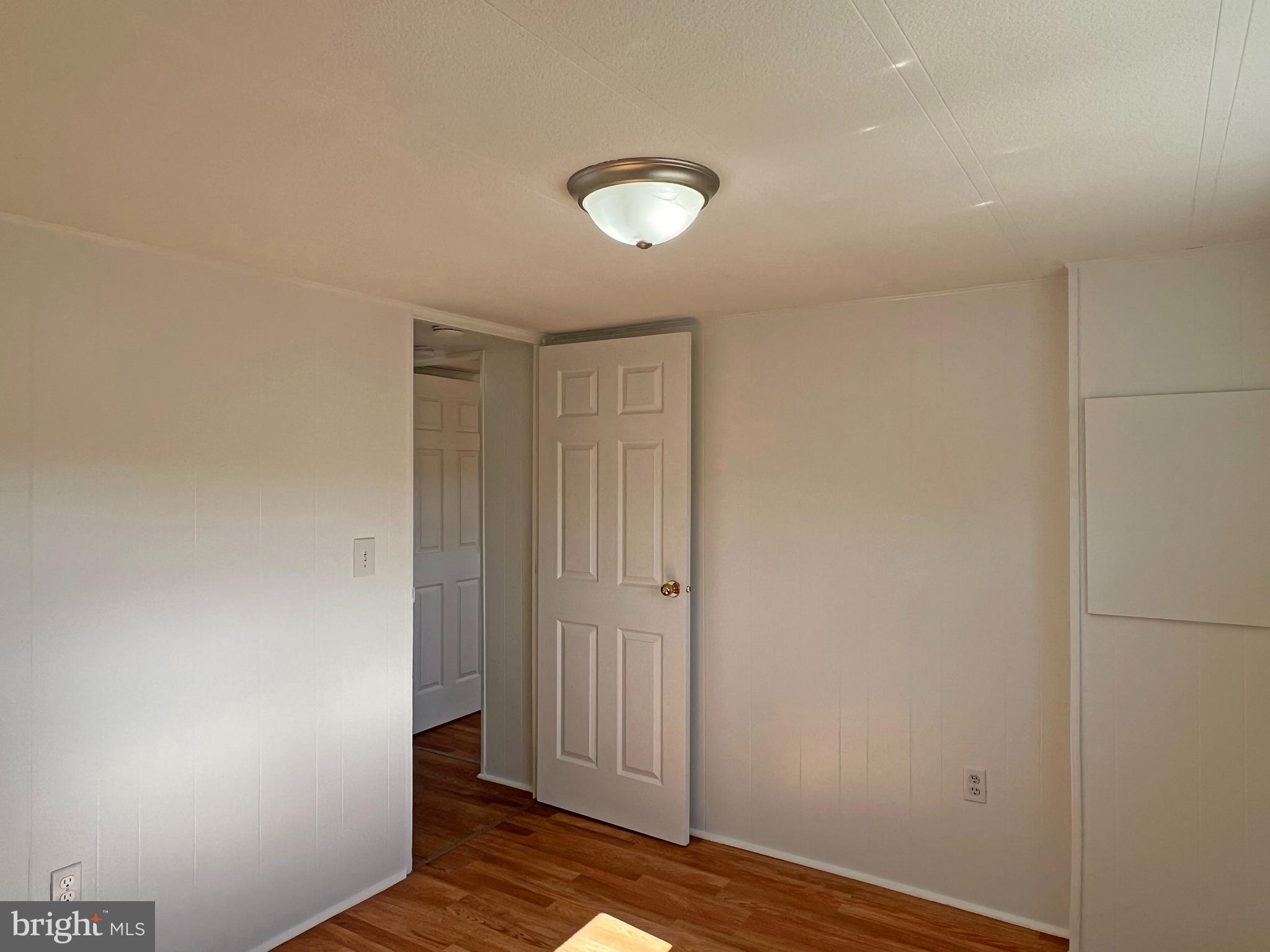 31658 Siham Road, Unit E42 Lewes, DE 19958 - Photo 22 of 35 a view of empty room