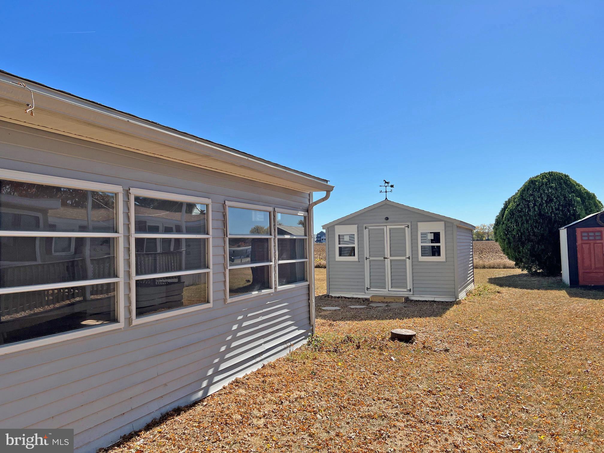 31658 Siham Road, Unit E42 Lewes, DE 19958 - Photo 30 of 35 a house view with a outdoor space