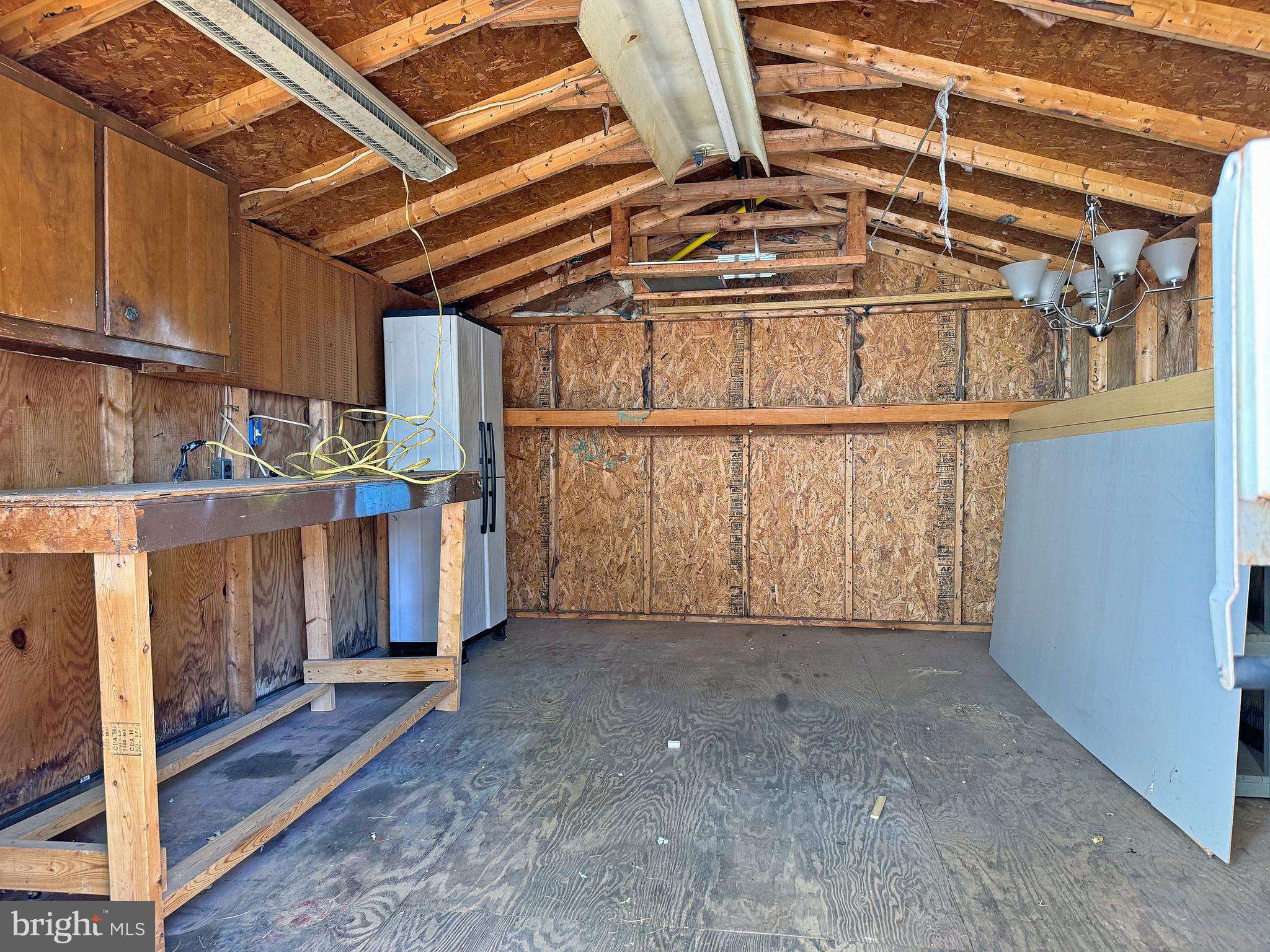 31658 Siham Road, Unit E42 Lewes, DE 19958 - Photo 32 of 35 a view of a room with wooden walls