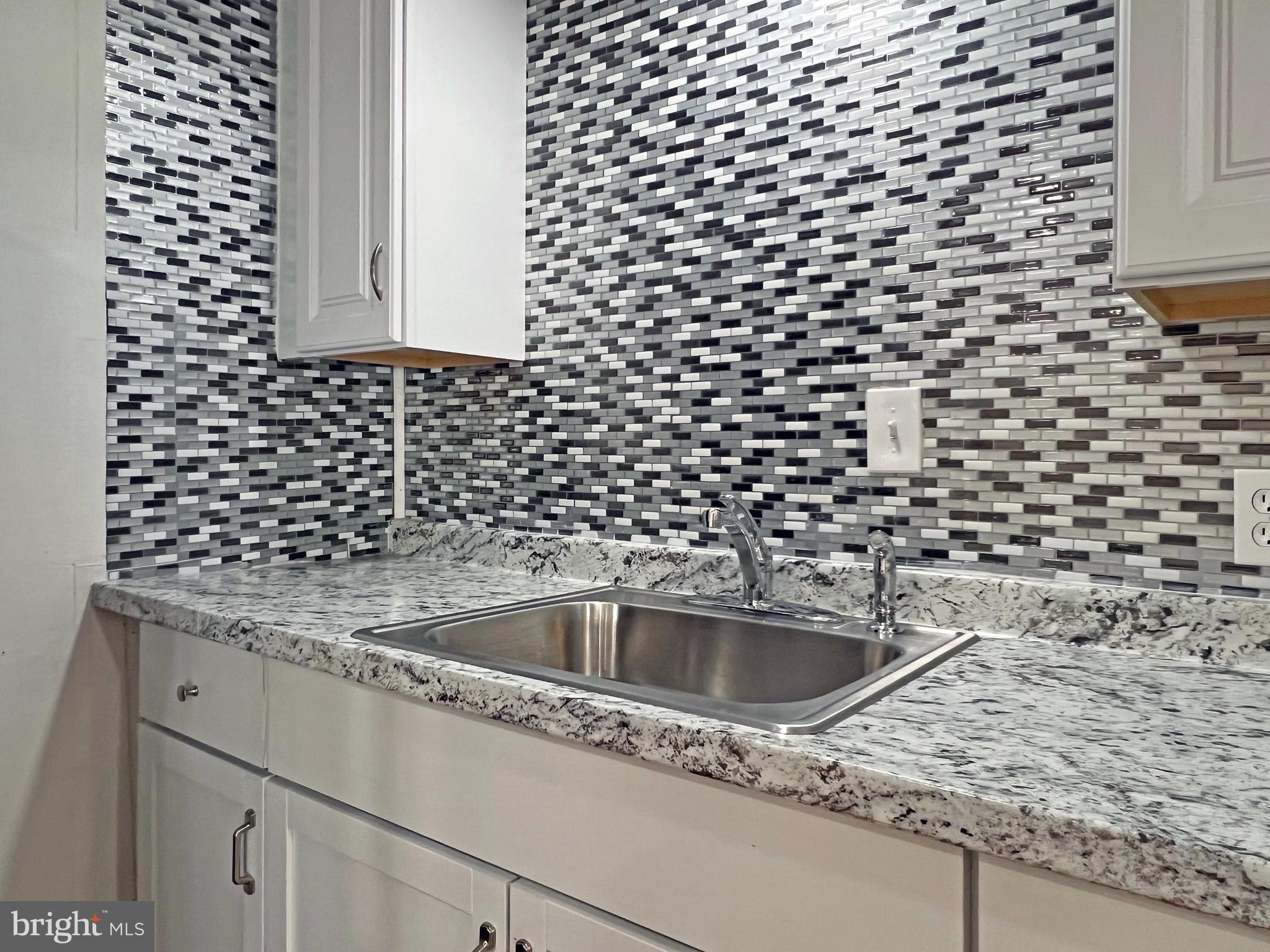 31658 Siham Road, Unit E42 Lewes, DE 19958 - Photo 8 of 35 a close view of a sink and a sink