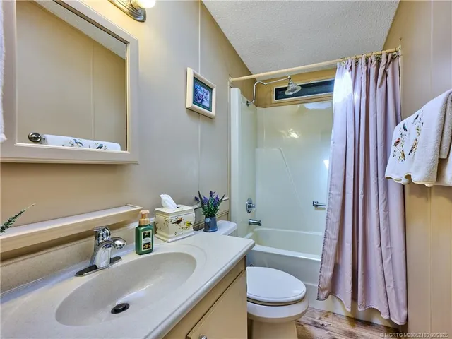 a vase of flowers sitting on a table