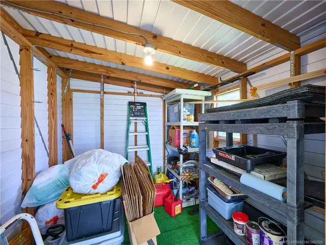 a view of residential houses with outdoor space and swimming pool