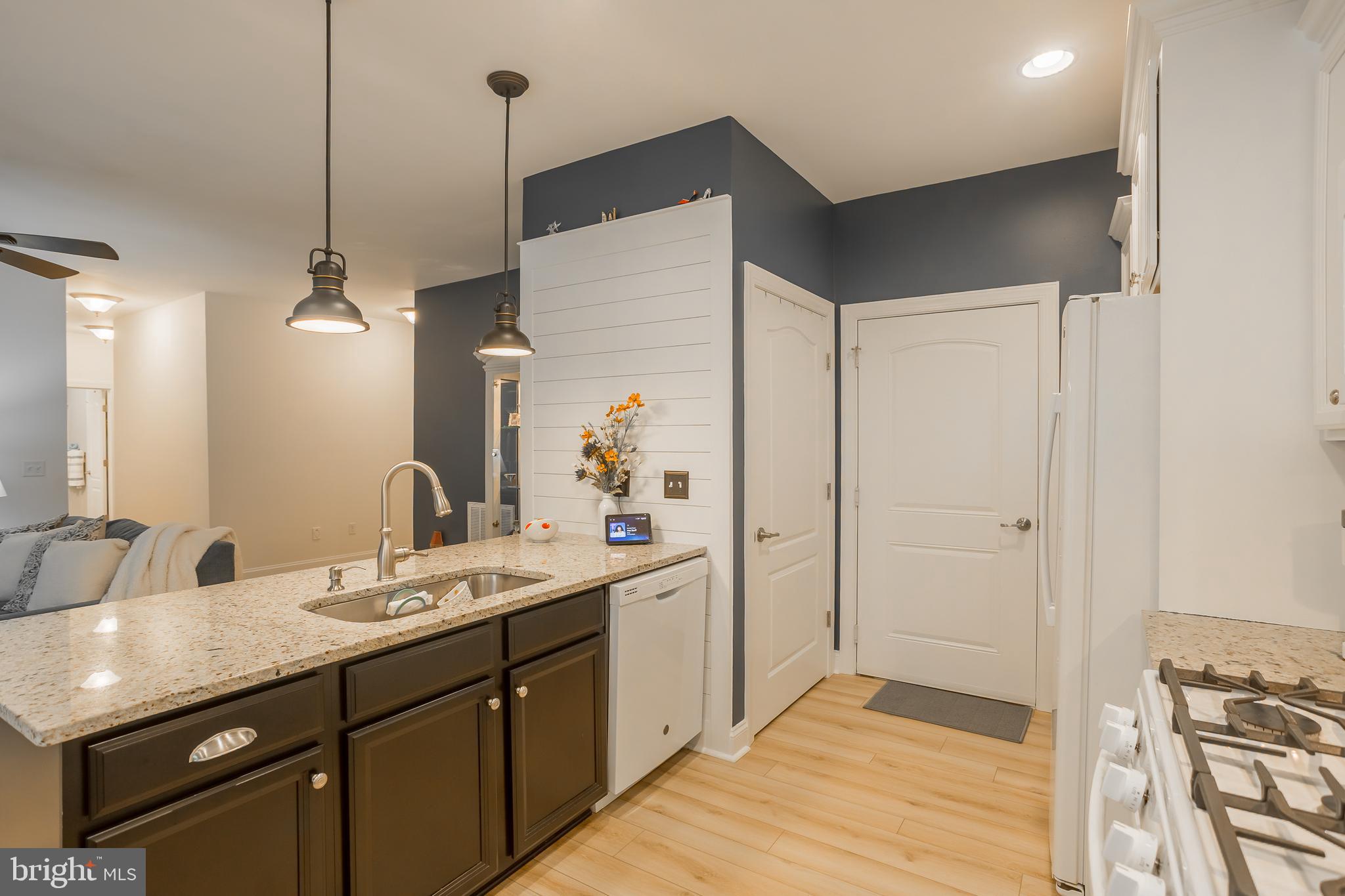 18308 Emerson Way Georgetown, DE 19947 - Photo 17 of 43 a bathroom with a sink and a mirror