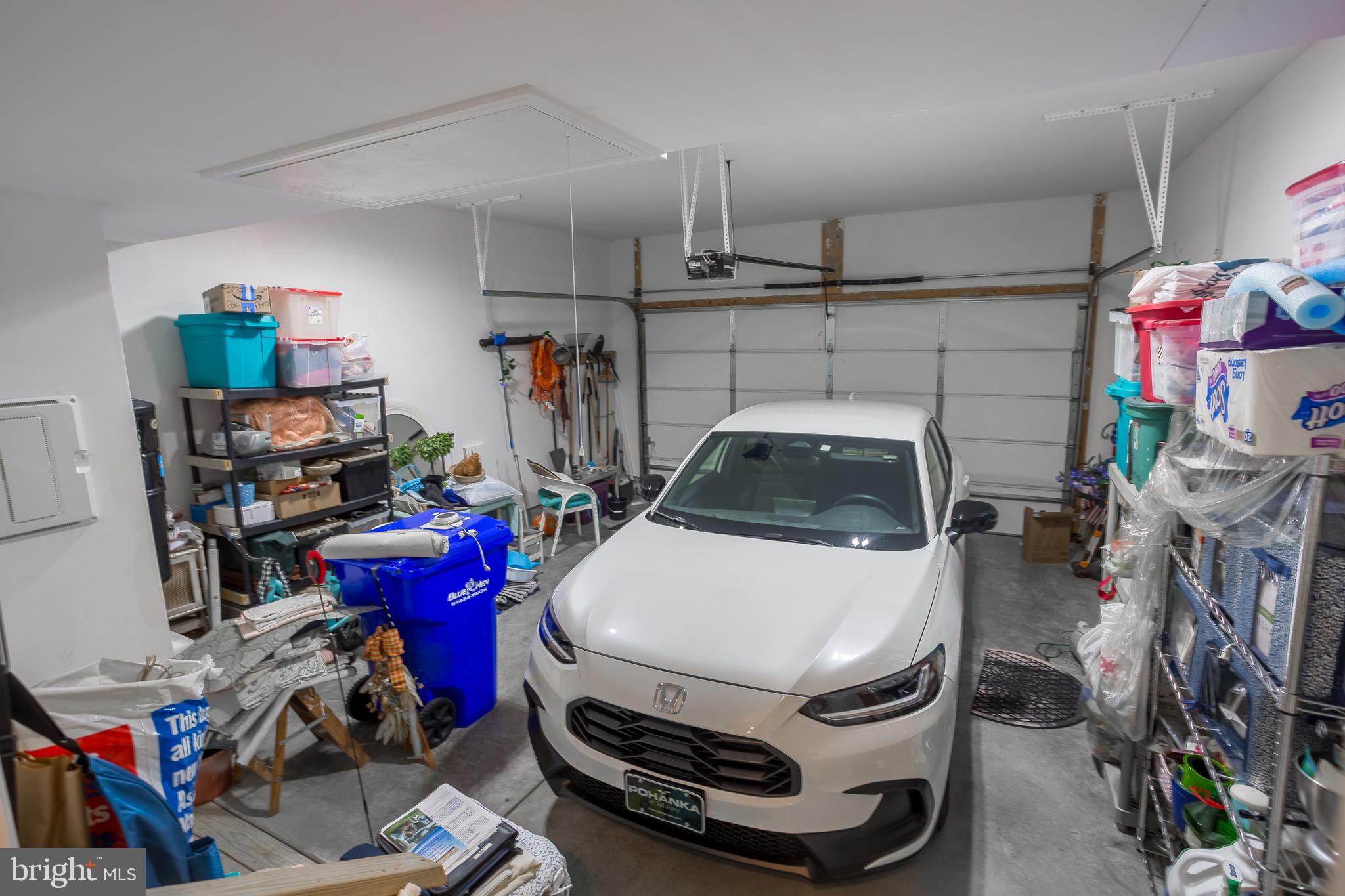 18308 Emerson Way Georgetown, DE 19947 - Photo 20 of 43 a car parked in garage