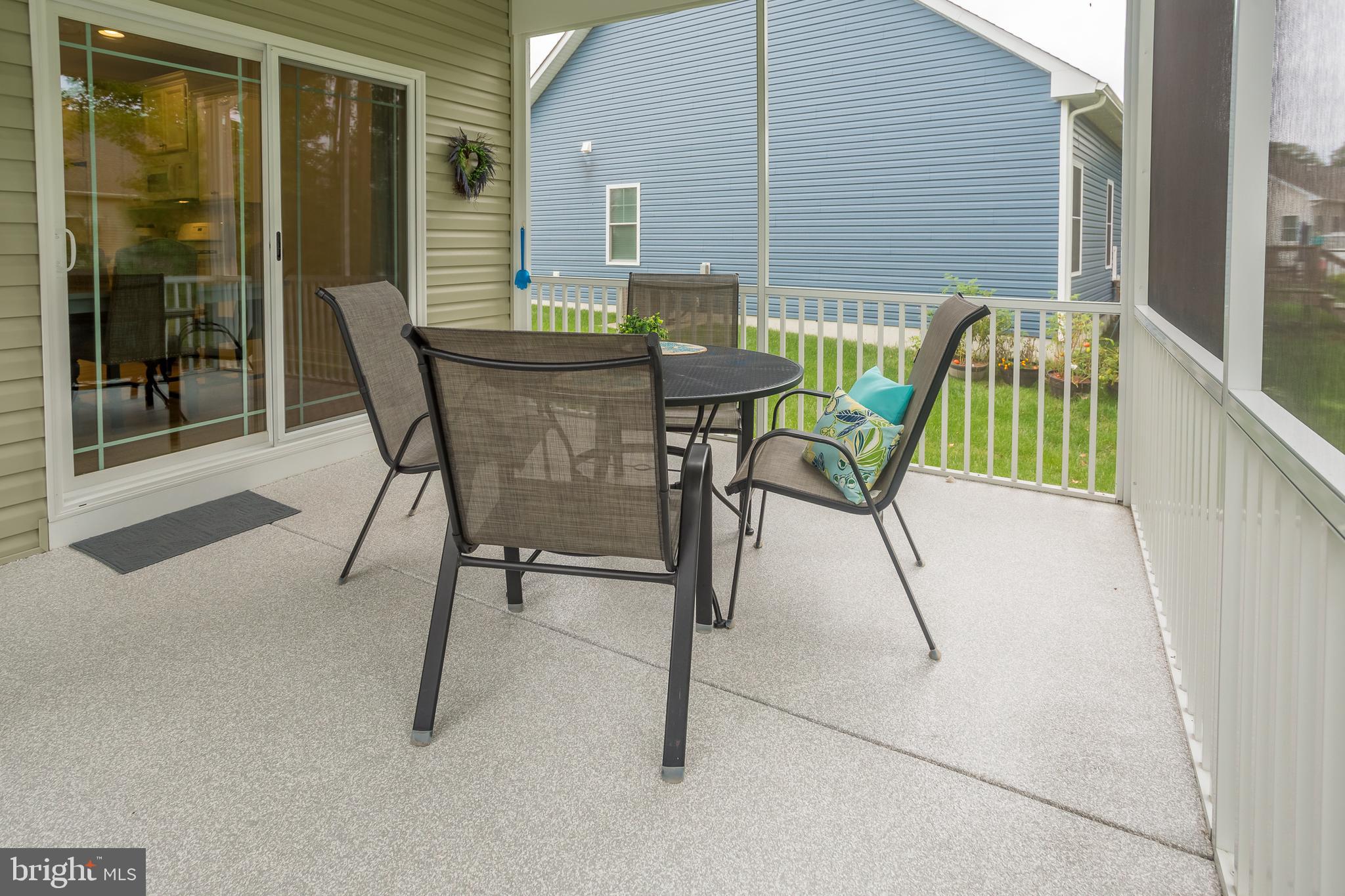 18308 Emerson Way Georgetown, DE 19947 - Photo 22 of 43 a view of an outdoor seating area