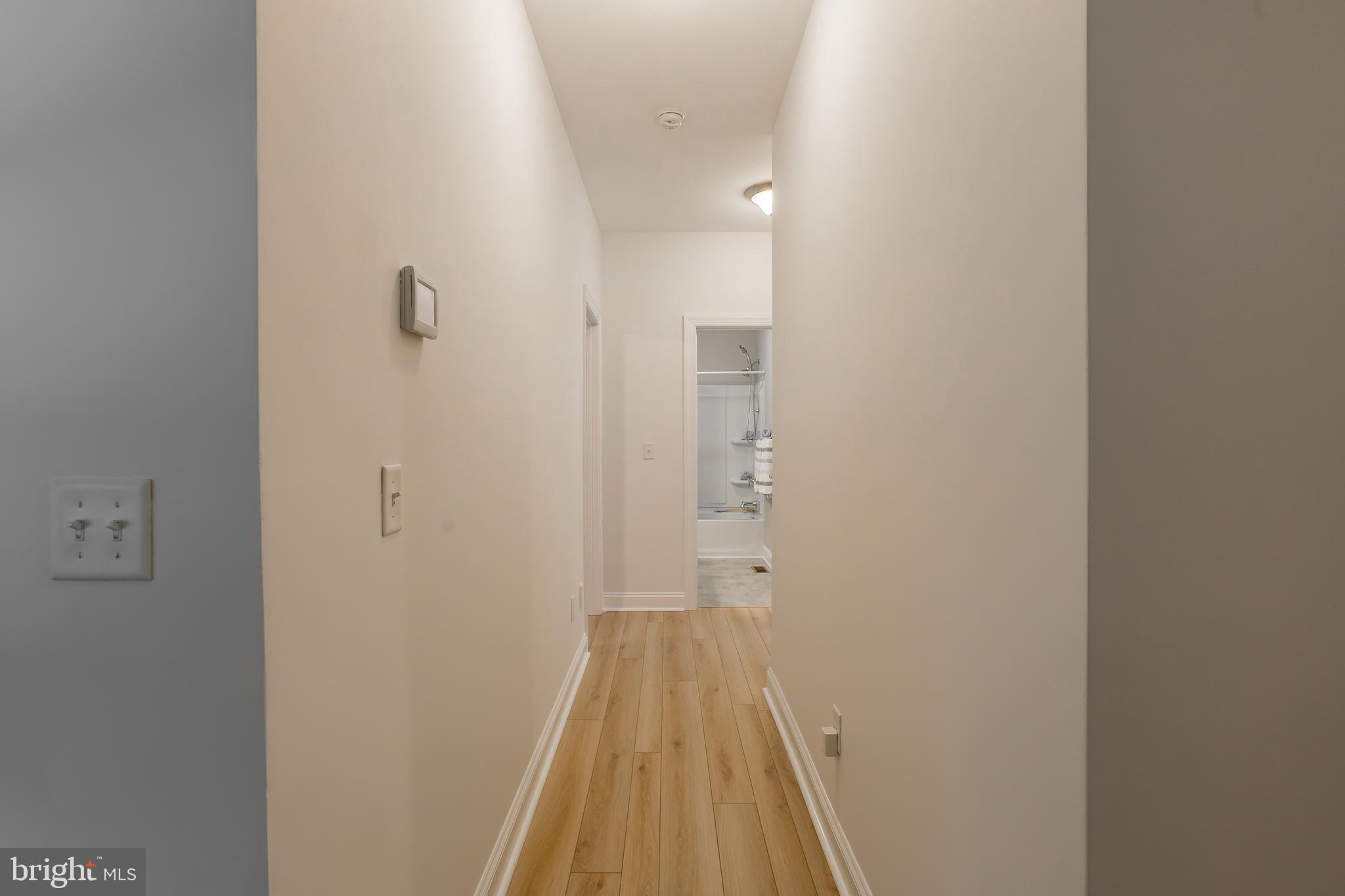 18308 Emerson Way Georgetown, DE 19947 - Photo 23 of 43 a view of a bathroom from a hallway