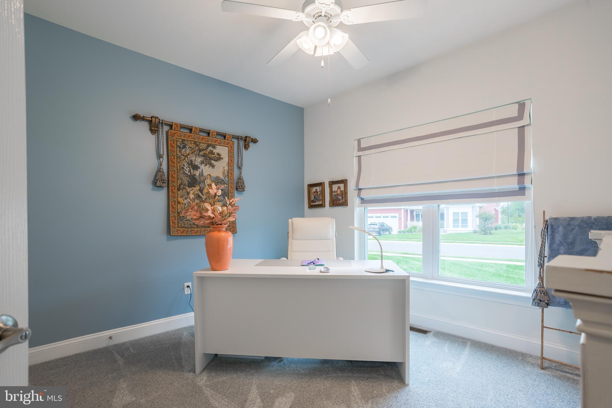 18308 Emerson Way Georgetown, DE 19947 - Photo 30 of 43 a living room with furniture and a window