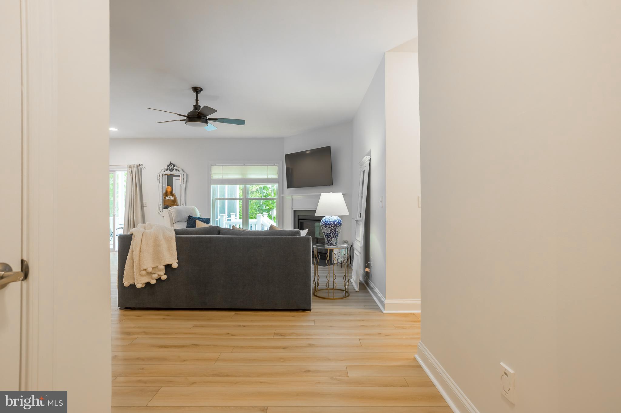 18308 Emerson Way Georgetown, DE 19947 - Photo 8 of 43 a view of a living room with furniture and a window