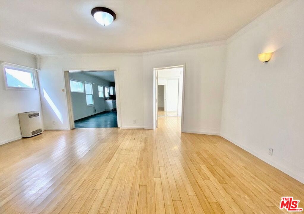 51 Ozone Avenue Venice, CA 90291 - Photo 7 of 11 a view of empty room with wooden floor and fan