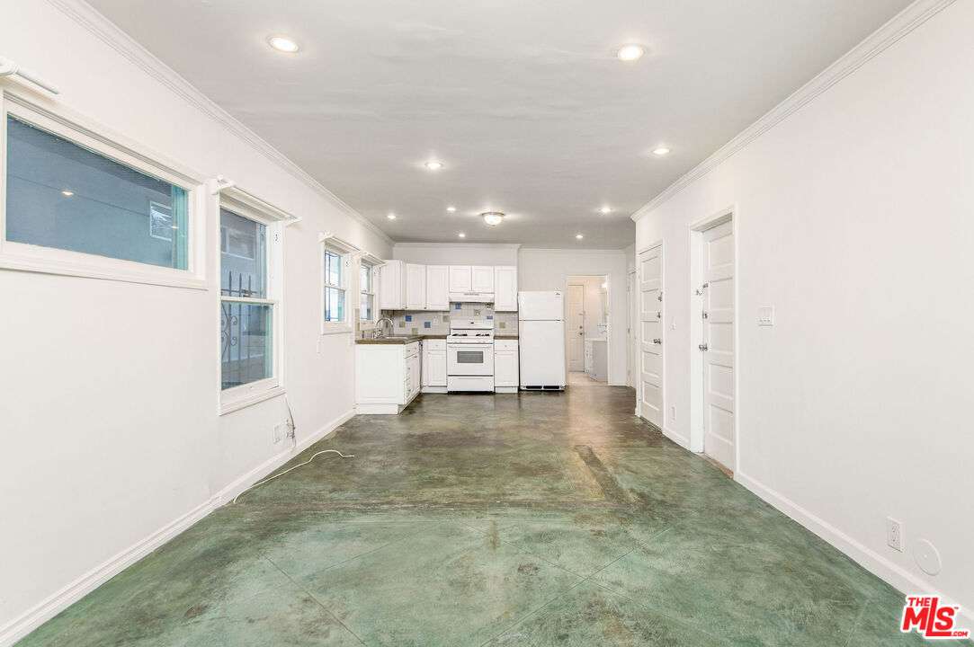 51 Ozone Avenue Venice, CA 90291 - Photo 10 of 11 a view of kitchen with refrigerator sink and wooden floor