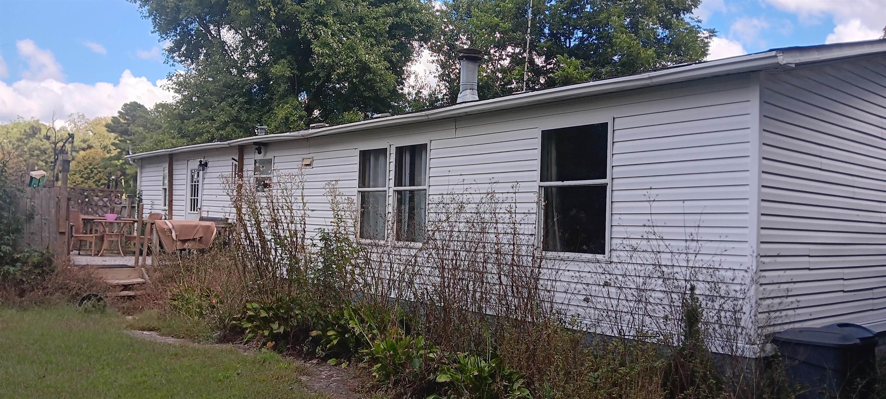 100 Academy Road Pulaski, TN 38478 - Photo 30 of 36 View of home's exterior featuring a deck