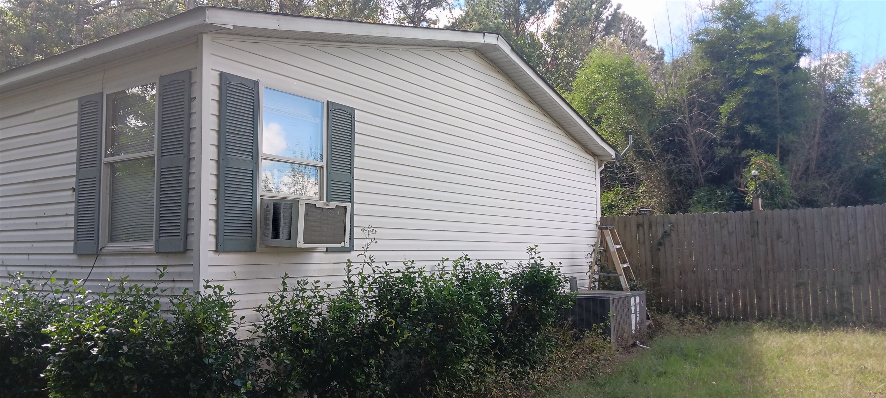 100 Academy Road Pulaski, TN 38478 - Photo 34 of 36 View of home's exterior featuring a cooling unit and cooling unit