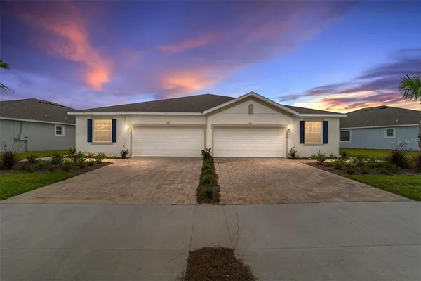 front view of a house with yard