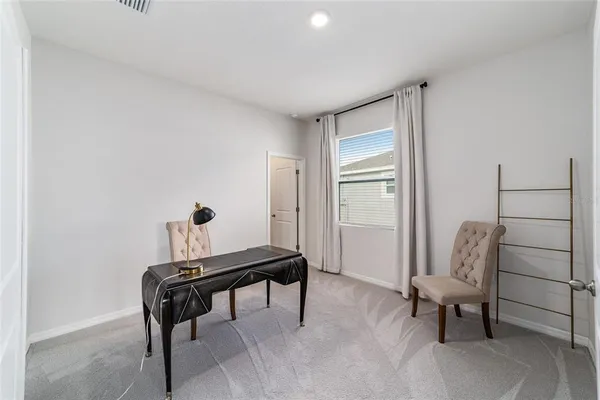 a room with furniture and a window